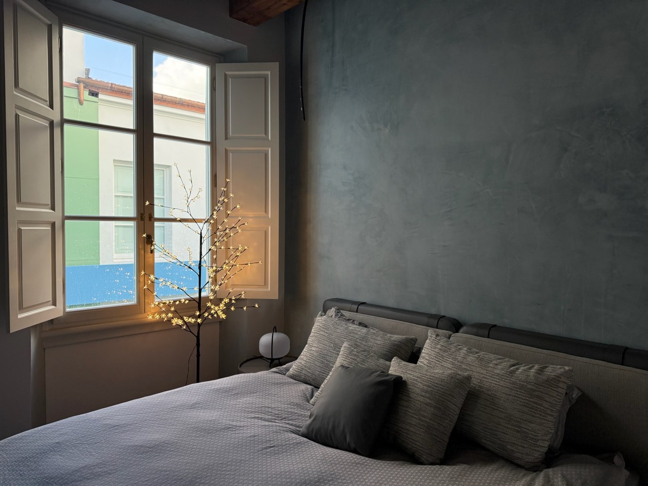 Arched window with original shutters