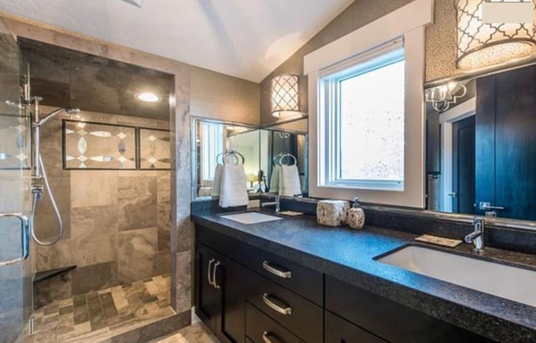 Master bathroom — patterned cement tile floor, double vanity, mountain view